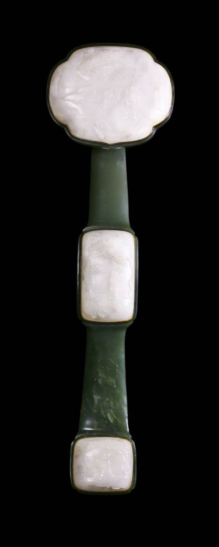 A Spinach Jade and White Jade Inset Ruyi Scepter, : A Spinach Jade and White Jade Inset Ruyi Scepter, having three white plaques with raised decoration set into the spinach green stem. Length 13 1/2 inches. Property of a Private Collector, Chicago, Ill