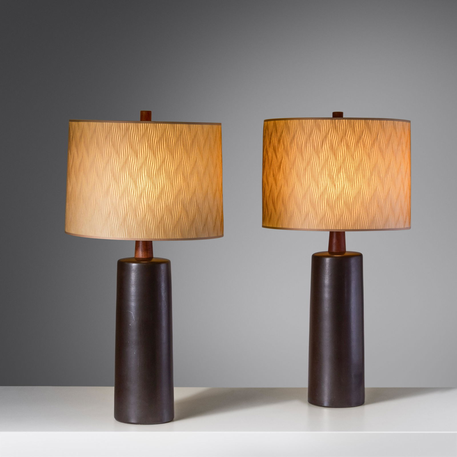 Gordon and Jane Martz (1924-2015 | 1929-2007) Pair of Monumental Table Lamps Marshall Studios, USA: Gordon and Jane Martz (1924-2015 | 1929-2007) Pair of Monumental Table Lamps Marshall Studios, USA glazed stoneware, walnut signed 'Martz' to lower edge of both examples H 46 x Dia 22 inches, overall