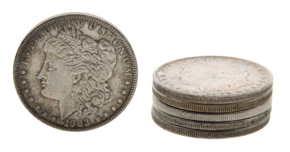 A Collection of Thirty U.S. Morgan Silver Dollars,: A Collection of Thirty U.S. Morgan Silver Dollars, comprising 1878, 1883, (2) 1889, 1889-O, (2) 1896, 1902-O, 1903, (9) 1921, (5) 1921-D and (7) 1921-S.