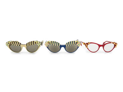 Three Pairs of Elsa Schiaparelli "Cabana" Glasses, 1950s: Three Pairs of Elsa Schiaparelli "Cabana" Glasses, 1950s This lot contains three pairs of sunglasses. THE FIRST Cream, black, and grey sunglasses with stripe design and floral accents at the side 