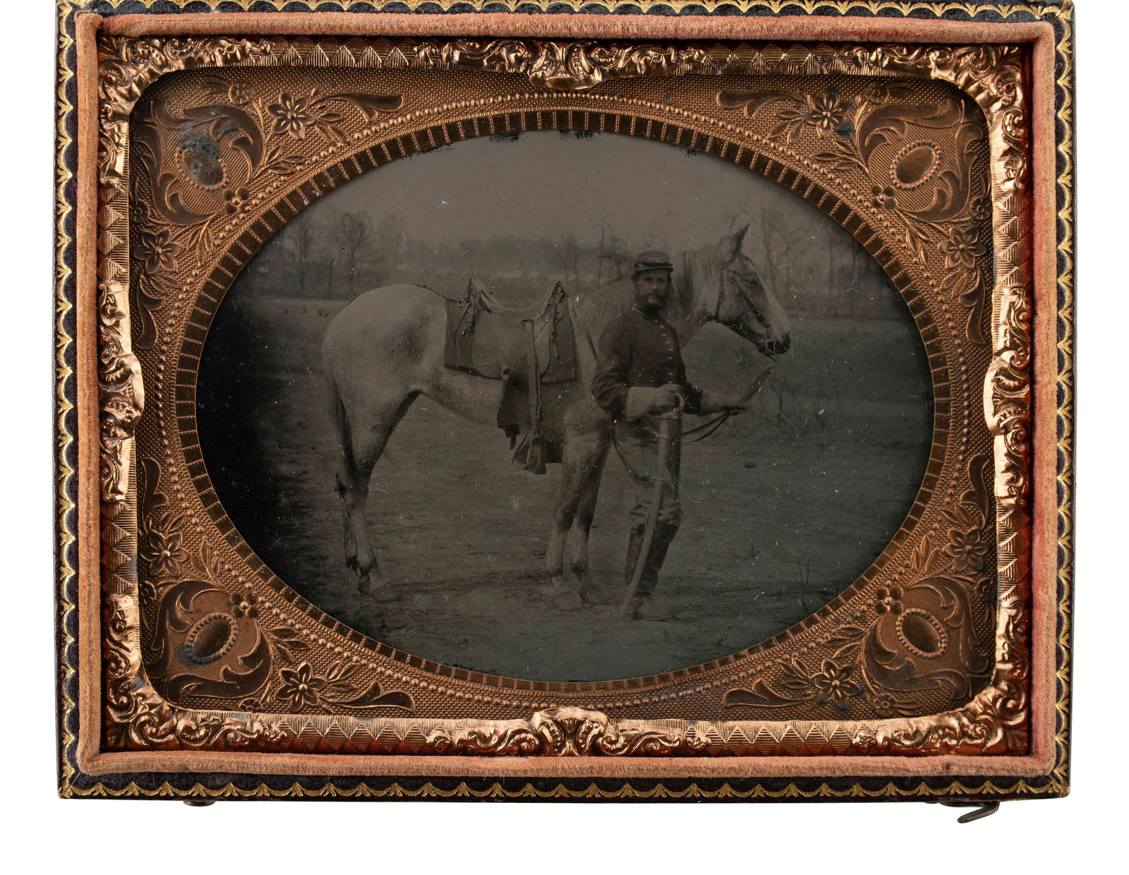 [CIVIL WAR]. Quarter plate tintype featuring a Union cavalryman with his horse. (1 of 3)
