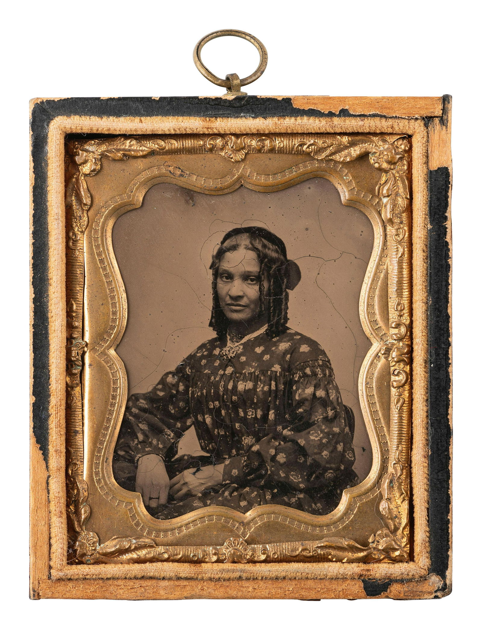 [AFRICAN AMERICANA - EARLY PHOTOGRAPHY]. Ninth plate ambrotype of an African American woman. (1 of 2)