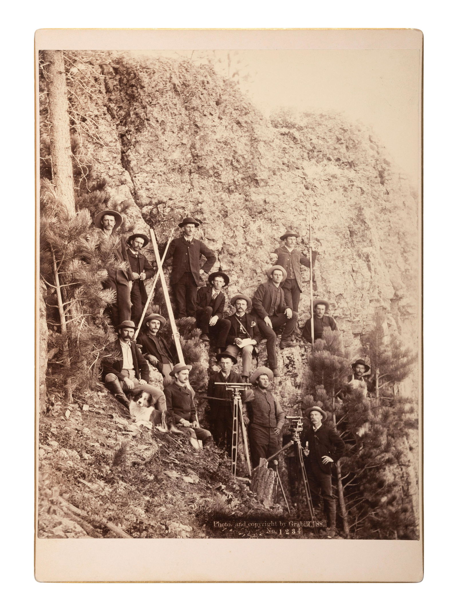 [WESTERN AMERICANA]. A group of 2 photographs of surveyors with equipment, incl. example by John (1 of 2)