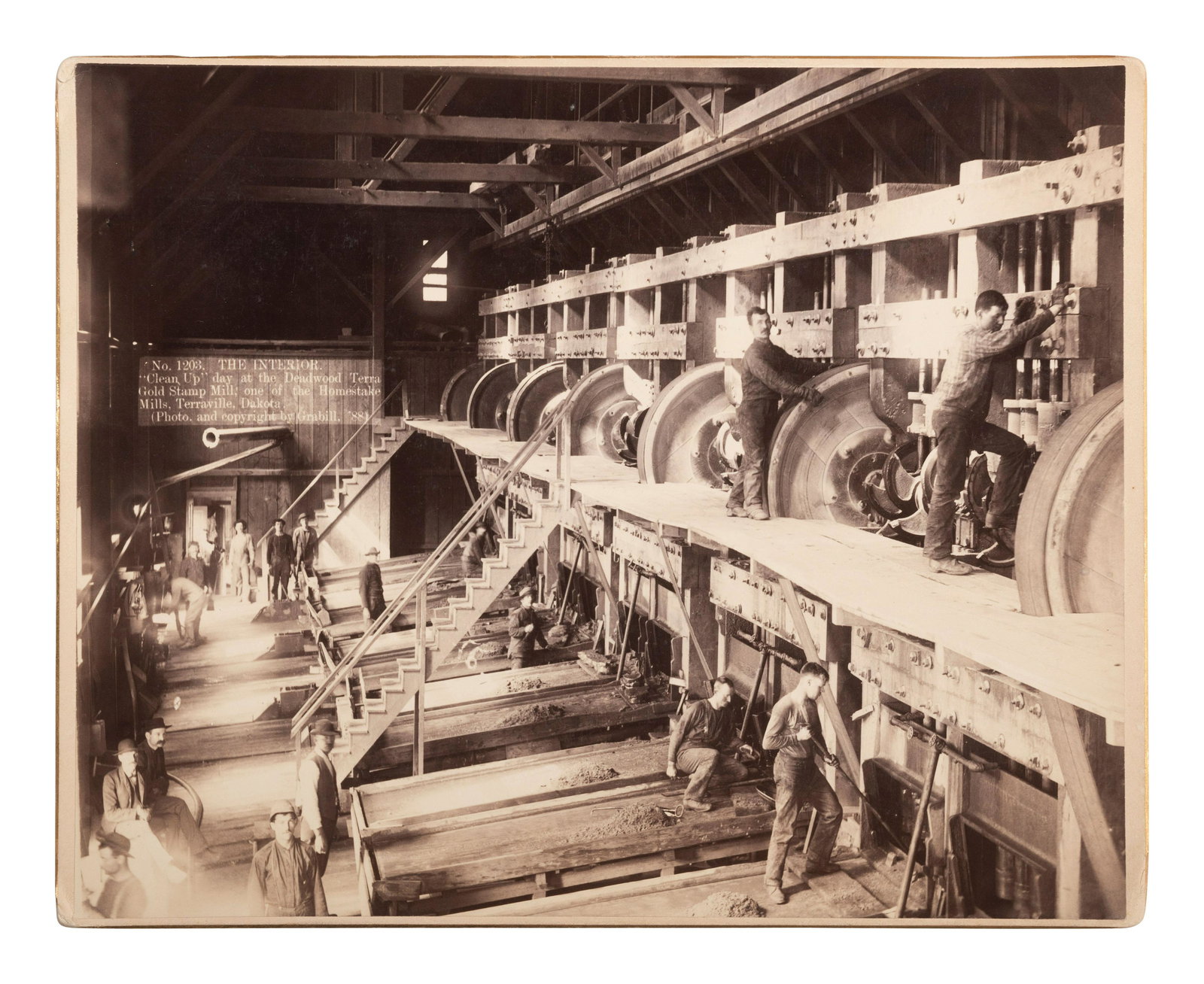 [WESTERN AMERICANA]. GRABILL, John C.H. (1849-1903), photographer. The Interior. "Clean Up" day at (1 of 1)