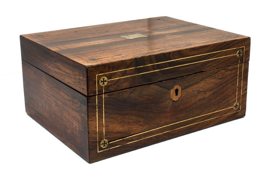 An English Rosewood and Brass Inlaid Box, Height 5 : An English Rosewood and Brass Inlaid Box, having a brass plate engraved Louisa. Height 5 x width 11 x depth 8 1/4 inches. 5 x 11 8-1/4 inches.
