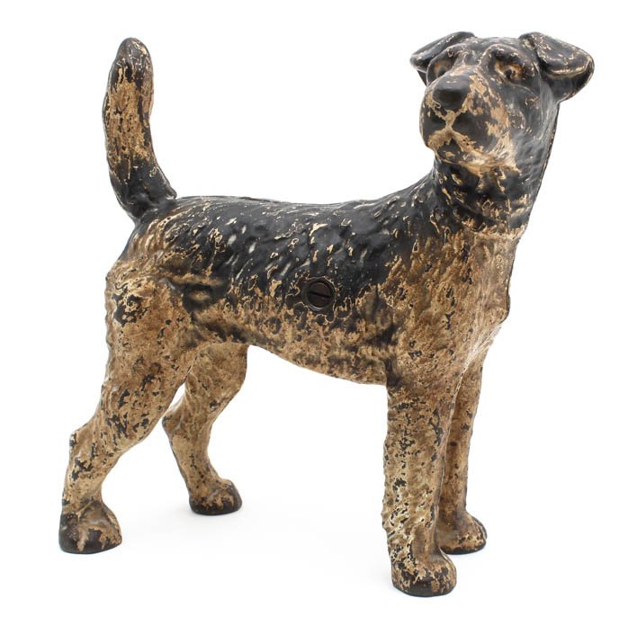 A Hubley Cast Iron Figural Door Stop, Height 8 1/4 : A Hubley Cast Iron Figural Door Stop, circa 1930, in the form of a Fox Terrier. Height 8 1/4 inches.