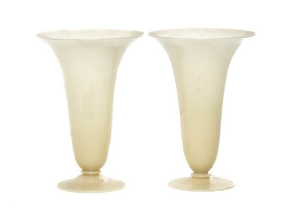 A Pair of Steuben Vases, Height 8 inches.: A Pair of Steuben Vases, each of yellow opaque glass with flared sides raised atop a circular foot. Height 8 inches.