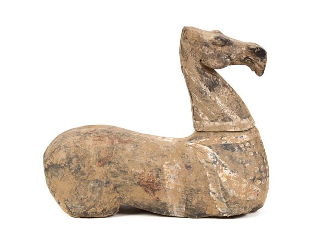 A Chinese Grey Pottery Tomb Horse, Height 15 x wid: A Chinese Grey Pottery Tomb Horse, Han style, of typical form, having polychrome decoration. Height 15 x width 17 1/2 x depth 5 inches. Property from the Collection of Roberta and Jerome Hirtenstein, 