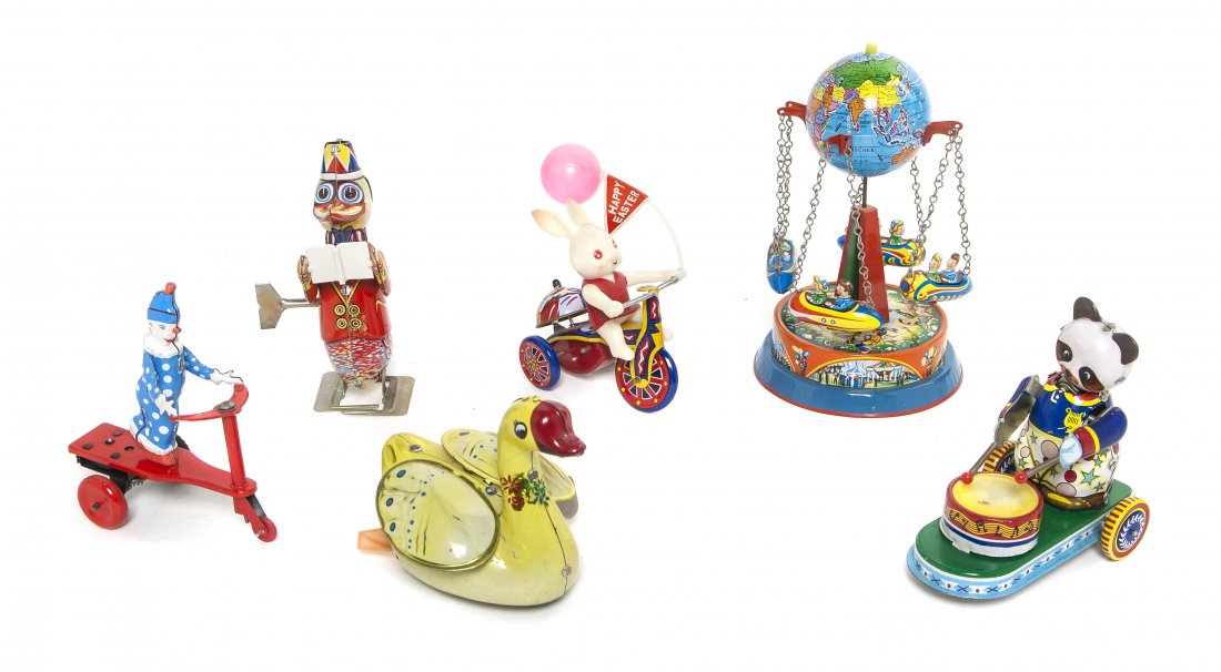 Five Pressed Tin Mechanical Toys, Height of talles: Five Pressed Tin Mechanical Toys, comprising a duck, a panda drummer, a clown, a swimming swan, a rabbit on a bike, together with a manual Western Germany spinning swing ride. Height of tallest 8 inch