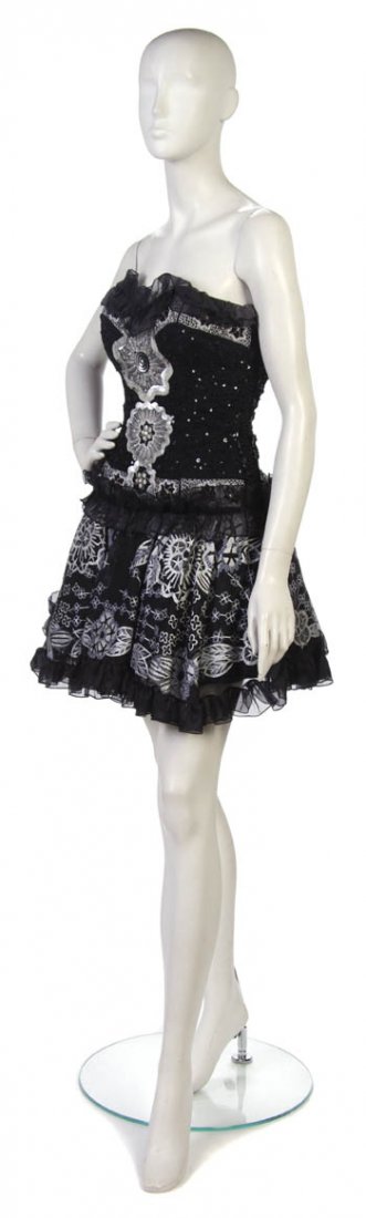 A Zandra Rhodes Black Strapless Cocktail Dress, UK : A Zandra Rhodes Black Strapless Cocktail Dress, with black and silver sequined bodice. Labeled: Zandra Rhodes Marshall Fields. UK Size 8.