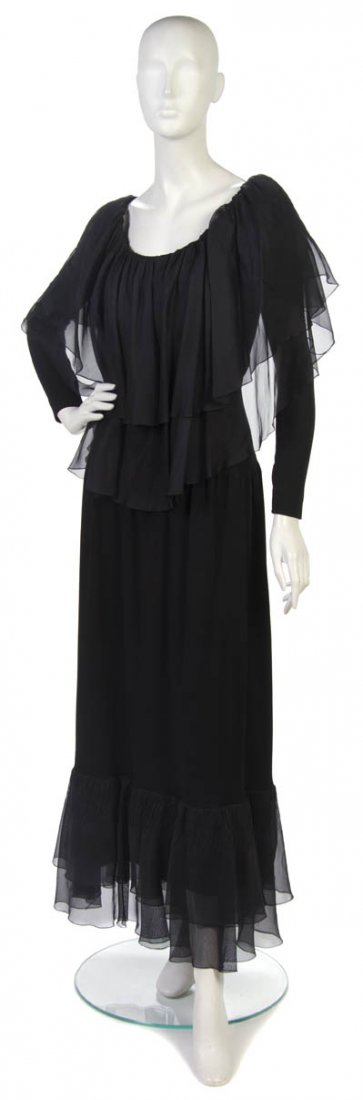 A Givenchy Couture Black Silk and Jersey Evening G: A Givenchy Couture Black Silk and Jersey Evening Gown, with a silk ruffle trim, neckline and hemline. Labeled: Givenchy/55467. Property to Benefit the Big Shoulders Fund, Chicago, Illinois