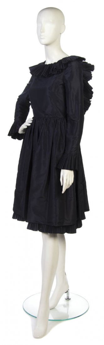 A Bill Blass Blue Silk Cocktail Dress,: A Bill Blass Blue Silk Cocktail Dress, with ruffle detail throughout, open back. Labeled: Bill Blass.