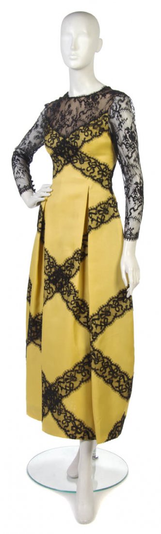 A Bill Blass Yellow Silk and Black Lace Evening Go: A Bill Blass Yellow Silk and Black Lace Evening Gown. Labeled: Bill Blass.