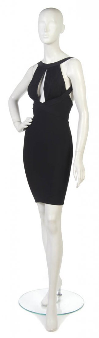 An Herve Leger Black Bandage Dress. Size M.: An Herve Leger Black Bandage Dress. Labeled: Herve Leger. Size M.