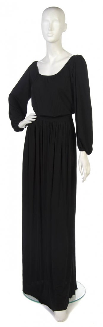 An Yves Saint Laurent Black Jersey Evening Gown.: An Yves Saint Laurent Black Jersey Evening Gown. Labeled: Yves Saint Laurent.