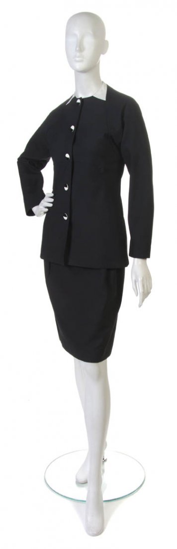 A Geoffrey Beene Black Cotton Skirt Suit.: A Geoffrey Beene Black Cotton Skirt Suit. Labeled: Geoffrey Beene.