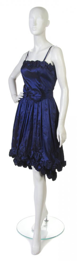 An Yves St. Tropez Blue Silk Cocktail Dress,: An Yves St. Tropez Blue Silk Cocktail Dress, with rosette hemline. Labeled: Yves St. Tropez.