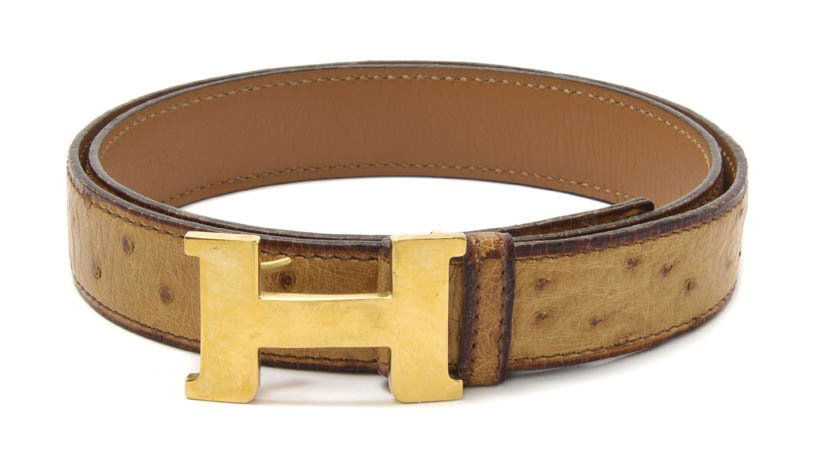 An Hermes 'Mini Constance' Cognac Ostrich Belt,: An Hermes 'Mini Constance' Cognac Ostrich Belt, with a gold H buckle, belt was named after one of Mr. Hermes' daughters. Stamped: Hermes. Property from an Hermes Collector, New York, New York