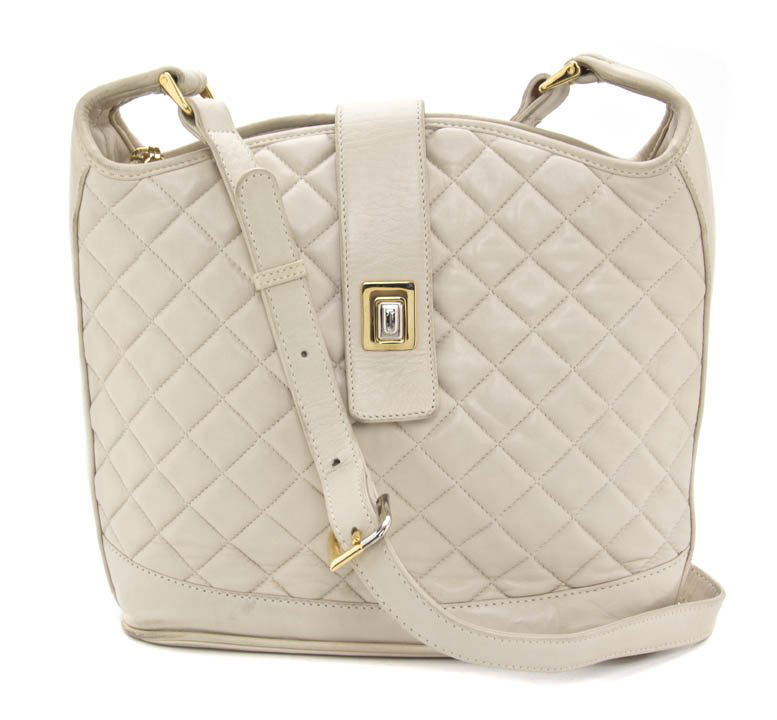 A Judith Leiber Off-White Quilted Leather Bag. 13: A Judith Leiber Off-White Quilted Leather Bag. Stamped: Judith Leiber. 13 x 10 inches. Property from a Lady, Chicago, Illinois