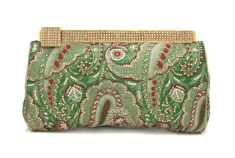 A Judith Leiber Green Silk and Red Crystal Evening: A Judith Leiber Green Silk and Red Crystal Evening Clutch. Labeled: Judith Leiber. 9 x 6 inches.