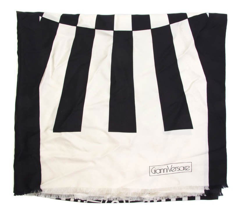 A Gianni Versace Black and White Silk Scarf. 38 x: A Gianni Versace Black and White Silk Scarf. Labeled within print: Gianni Versace. 38 x 70 inches. Property from a Lady, Chicago, Illinois
