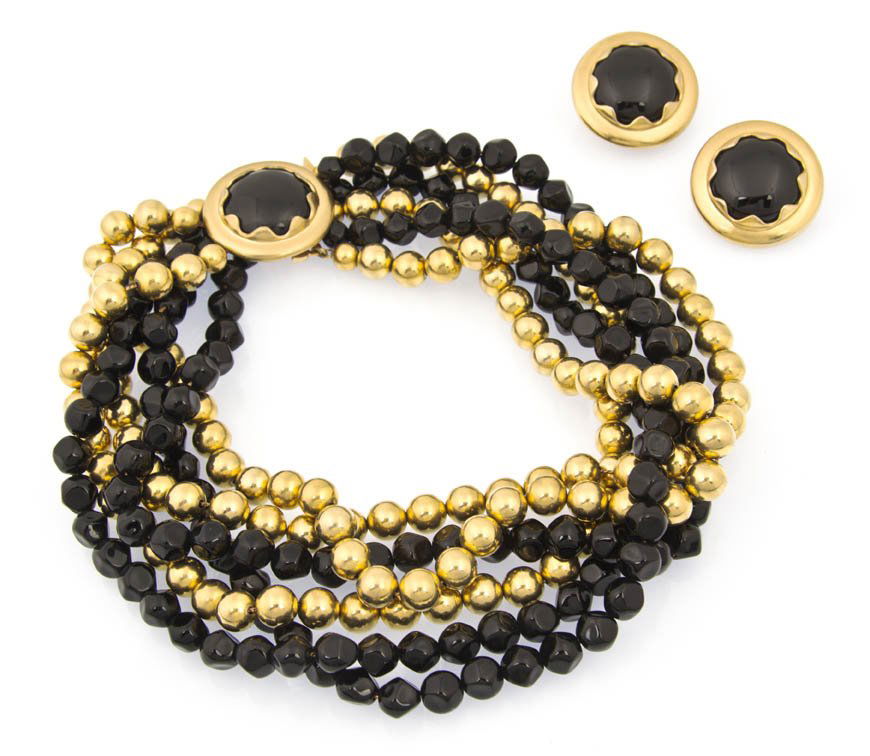 An Anne Klein Black and Goldtone Bead Torsade,: An Anne Klein Black and Goldtone Bead Torsade, together with matching earclips. Stamped: Anne Klein. Property from a Lady, Chicago, Illinois