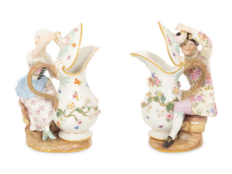 A Pair of Meissen Porcelain Figural Ewers: A Pair of Meissen Porcelain Figural Ewers 19th/20th Century each marked under foot with underglaze blue crossed swords. Height 7 3/4 inches. This lot is located in Palm Beach. Property