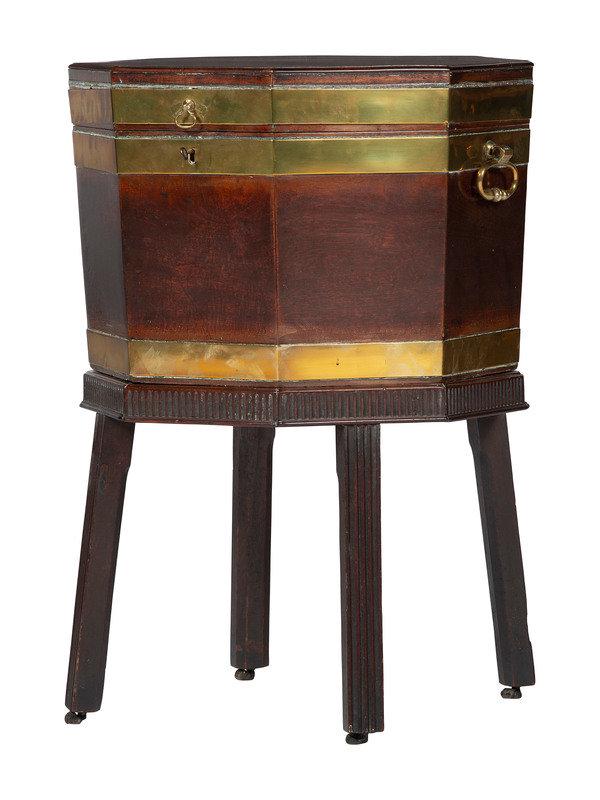 A Georgian Mahogany Brass Mounted Wine Cooler on Stand: A Georgian Mahogany Brass Mounted Wine Cooler on Stand 19th Century Height 27 1/4 inches. This lot is located in Cincinnati. Property from a Private Collection, Cincinnati, Oh