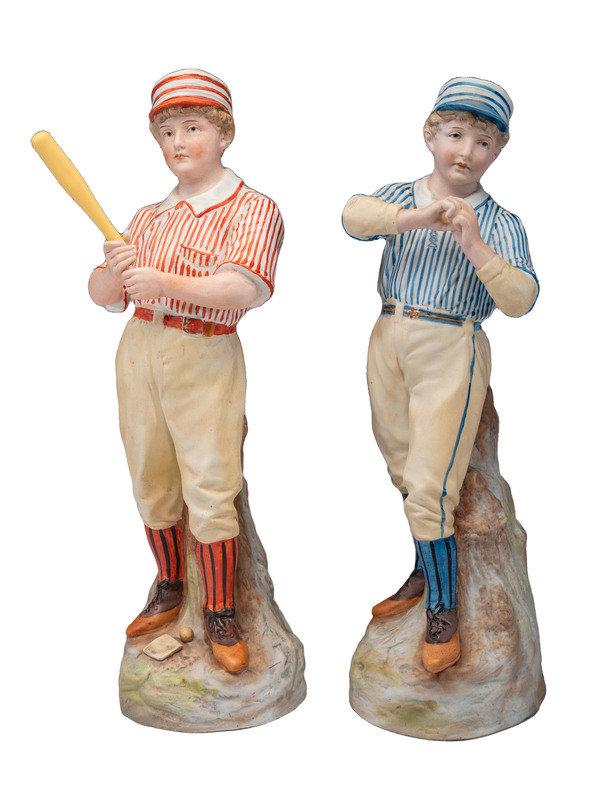 A Pair of German Bisque Porcelain Baseball Figures: A Pair of German Bisque Porcelain Baseball Figures Gebruder Heubach, Lichten, Germany, Late 19th Century with maker's mark to underside.Height 14 inches. This lot is located in Cincinnati.<