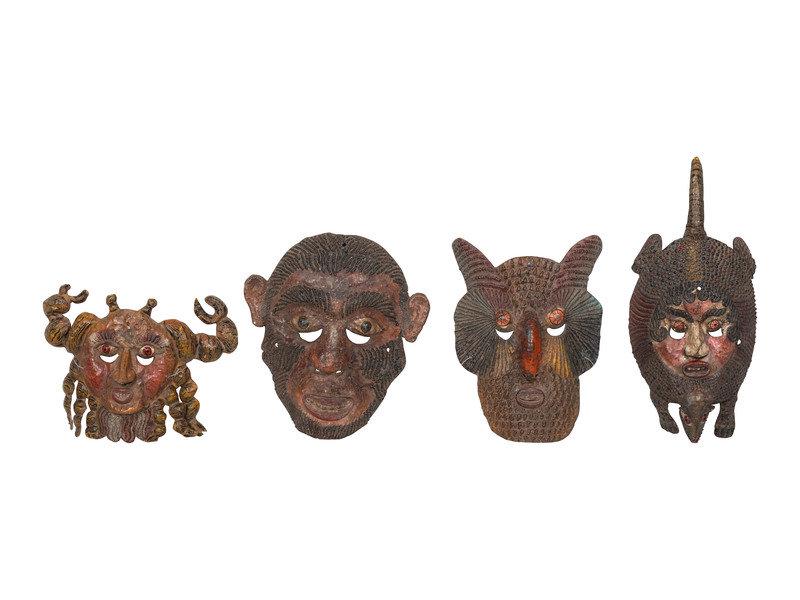 Four Mexican Copper Festival Masks: Four Mexican Copper Festival Masks 20th Century including an armadillo, monkey, owl and crab. together with five other carved wood masks. Length of largest 22 inches. This lot is locate