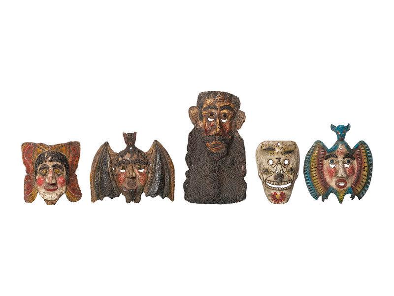 Five Mexican Copper Festival Masks: Five Mexican Copper Festival Masks 20th Century comprising a butterfly, two bats, a skull, and a bearded man. Height of largest 21 1/4 inches. This lot is located in Cincinnati. Proper