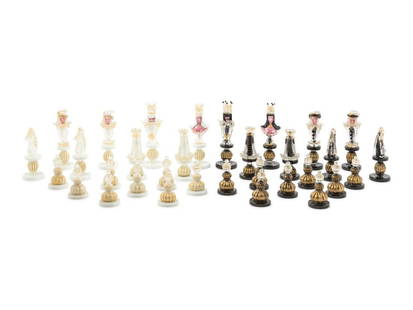 An Italian Murano Glass Chess Set: An Italian Murano Glass Chess Set Nigri Scacchi, 20th Century most pieces with a Made in Italy Murano sticker to the underside. Height of tallest 6 3/4 inches. This lot is located in Chicago. Property