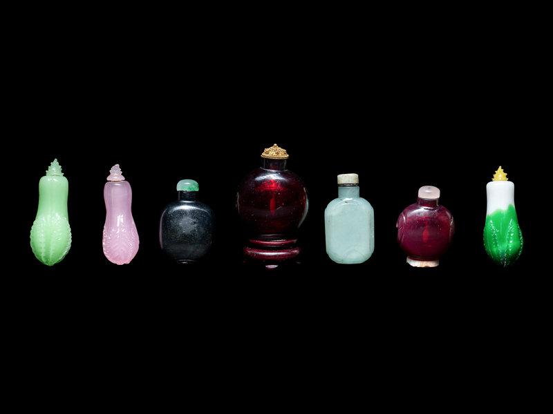 Seven Chinese Glass Snuff Bottles: Seven Chinese Glass Snuff Bottles 19th-20th Century comprising two glass imitating amber examples, two glass imitating jadeite 'cabbage' example, one pink glass imitating rose quartz 'cabbage' example