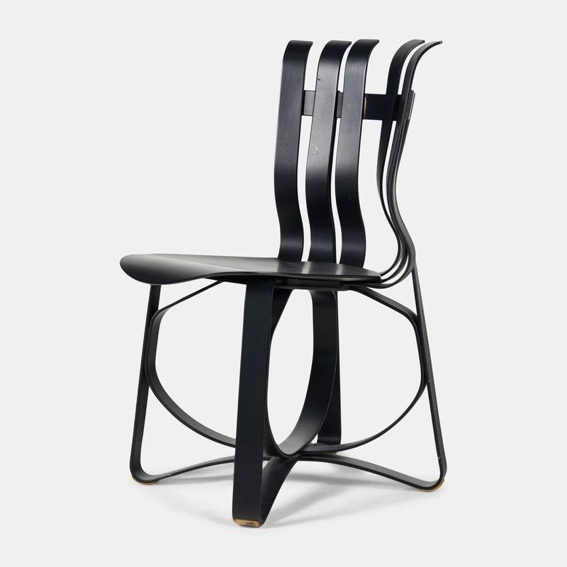Frank Gehry (Canadian, b. 1929) Hat Trick ChairKnoll, USA: Frank Gehry (Canadian, b. 1929) Hat Trick ChairKnoll, USA bent and laminated maple with manufacturer's mark H 33 1/2 x W 19 1/4 x D 20 inches. Property from the Collection of Edith
