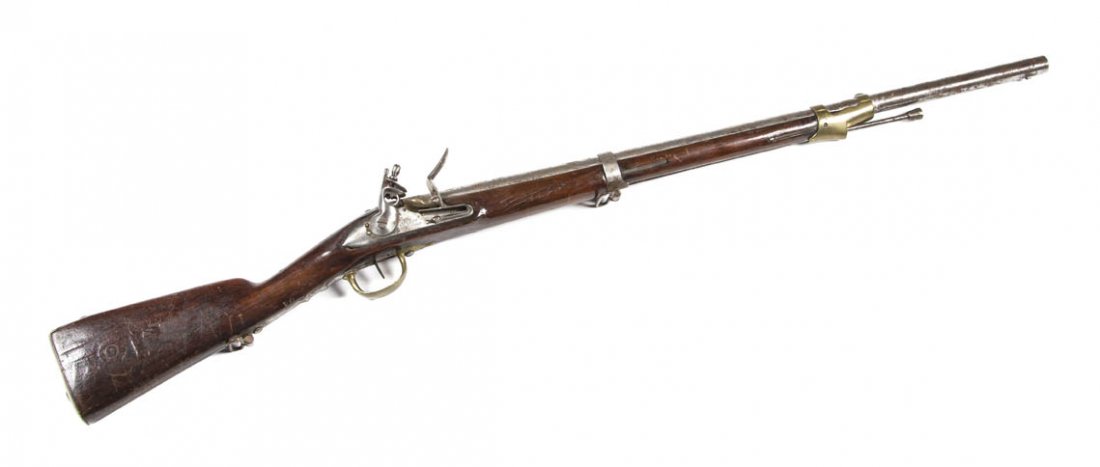 A French Flint Lock Musket, Height 45 inches.: A French Flint Lock Musket, with steel barrels and brass mounts, inscribed illegibly. Height 45 inches. Property from O'Hara's Gallery, Chicago, Illinois
