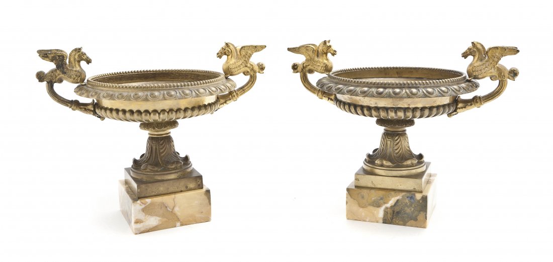 A Pair of Neoclassical Gilt Bronze Tazze, Height 8: A Pair of Neoclassical Gilt Bronze Tazze, 19th century, each of circular form with a gadrooned rim flanked by pegasus handles, raised on acanthus decorated bases and set on sienna marble plinths. Heig