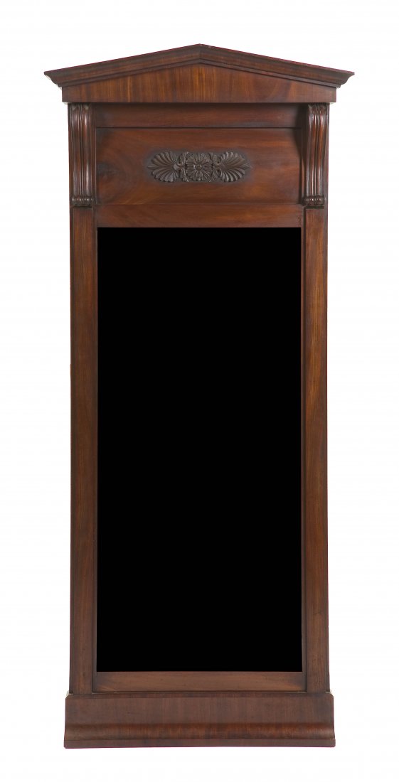 A Biedermeier Pier Mirror, Height 60 1/4 x width 2: A Biedermeier Pier Mirror, having a peaked crest over a carved rosette and palmette decoration above the vertical plate. Height 60 1/4 x width 26 1/8 inches.