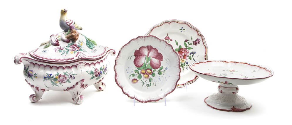 An Assembled French Faience Dessert Service, Width: An Assembled French Faience Dessert Service, comprising a covered tureen, 2 tazze and 16 plates of two sizes, each having polycrome decoration throughout. Width of tureen 13 1/8 inches.