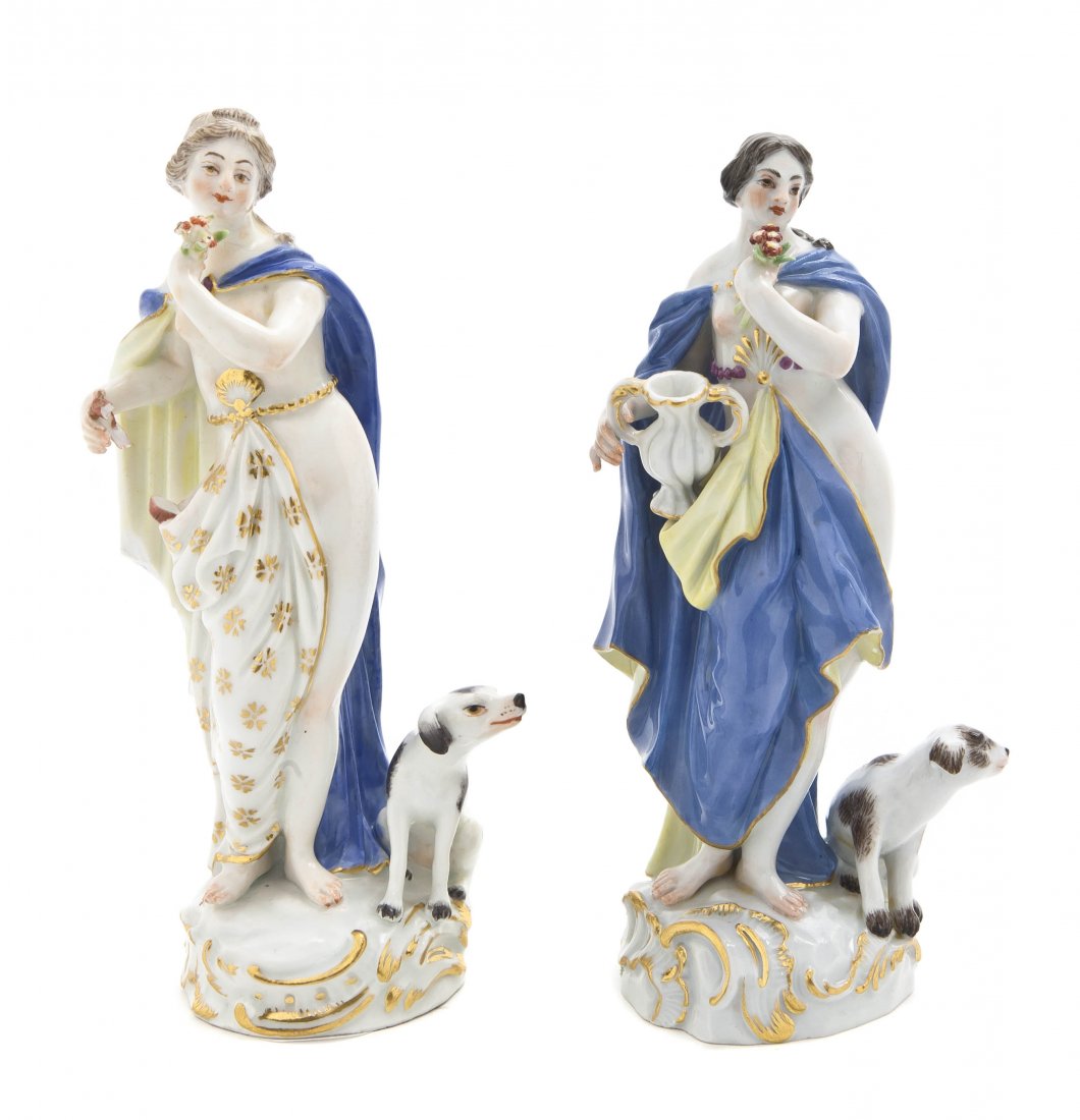Two Meissen Porcelain Figures, Height of taller 5: Two Meissen Porcelain Figures, each depicting a classical maiden with dog, having crossed swords marked in underglaze blue, one dotted, with various incised and impressed marks. Height of taller 5 3/4