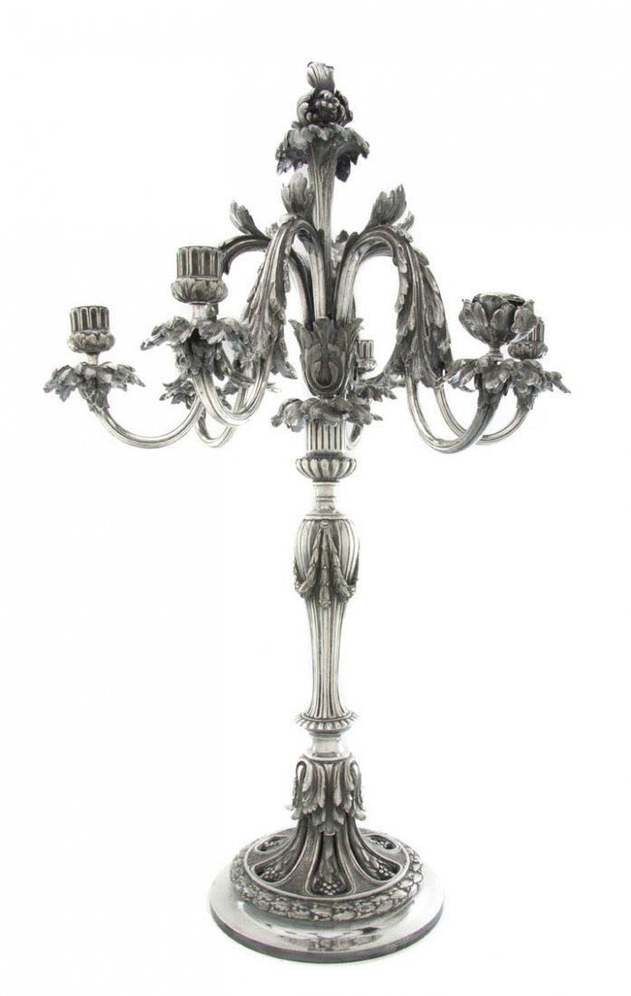 A French Silverplate Six-Light Candelabrum, Chris: A French Silverplate Six-Light Candelabrum, Christofle, in the French Victorian manner, one candle cup unmatched. Height 30 inches.