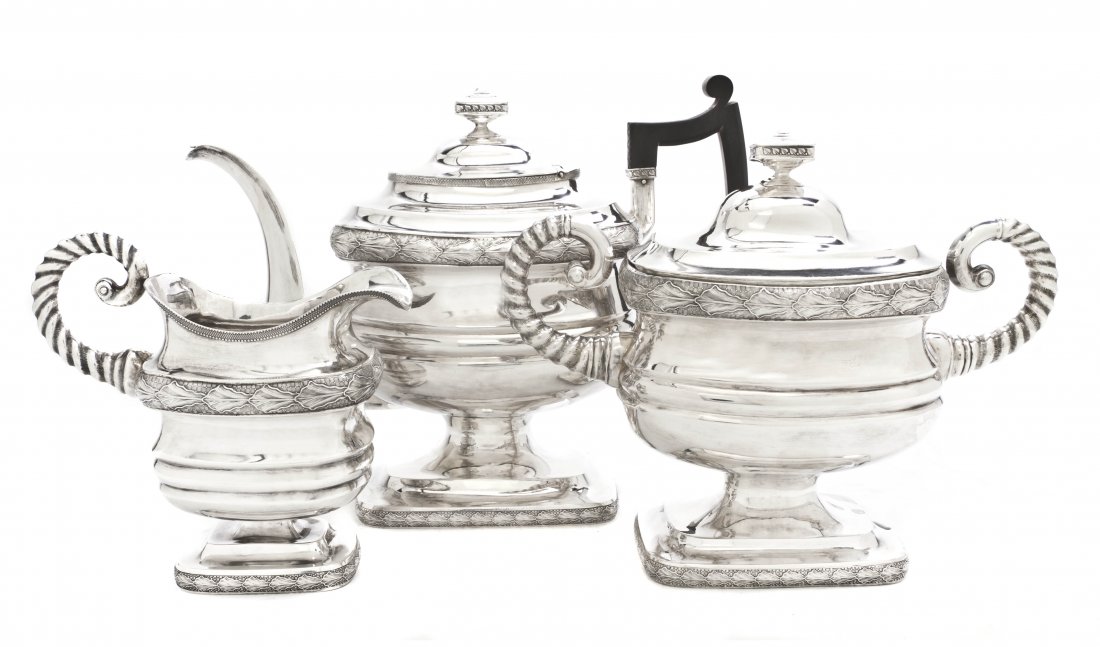 An American Coin Silver Tea Service, Jedediah Bal: An American Coin Silver Tea Service, Jedediah Baldwin, Portsmouth, New Hampshire, late 18th/early 19th century, of rectangular baluster form, comprising a teapot with applied ebonized wood handle and 