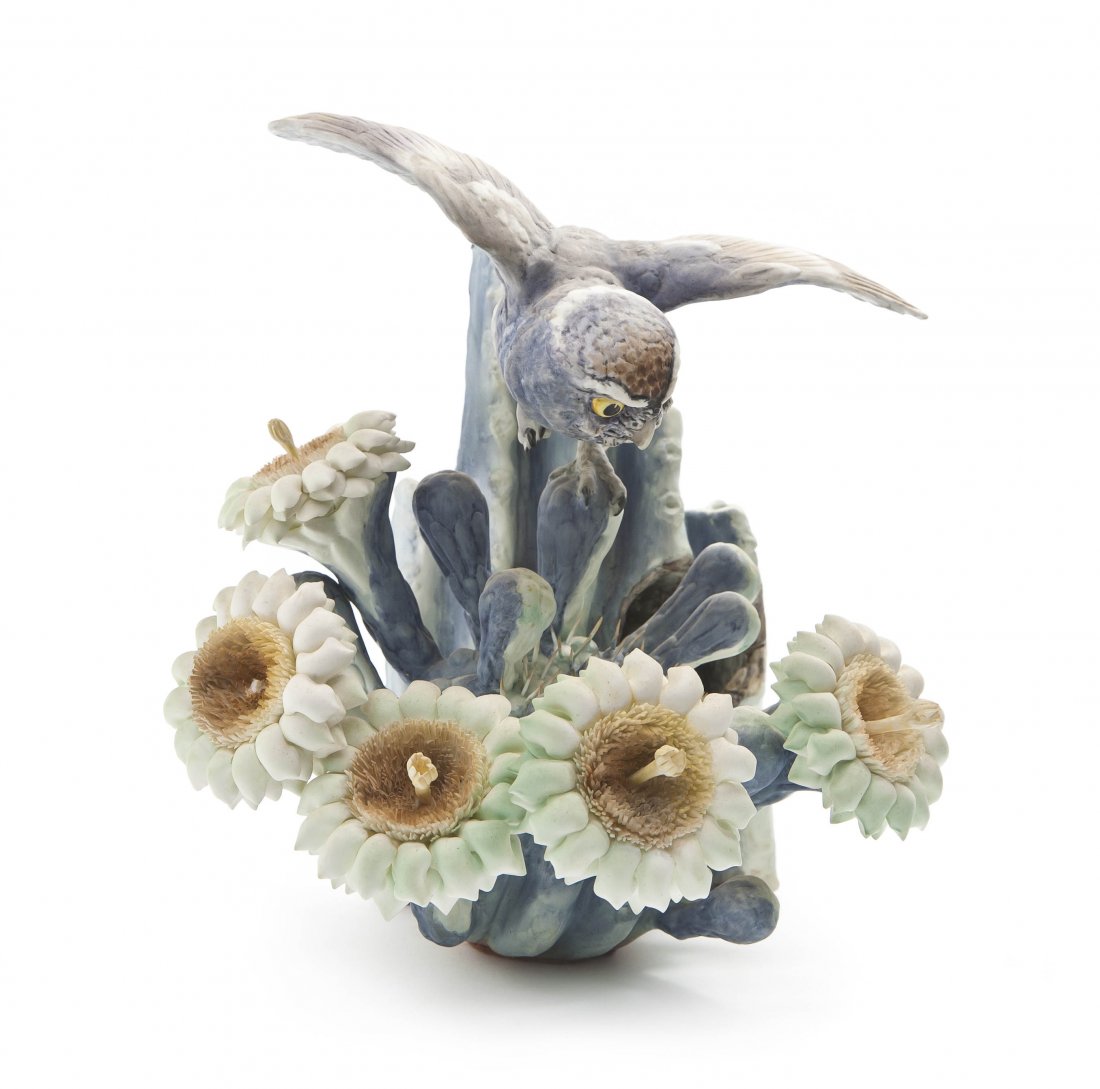 A Royal Worcester Dorothy Doughty Bird, Elf Owl, : A Royal Worcester Dorothy Doughty Bird, Elf Owl, perched on a squaro cactus. Height 11 1/2 inches.