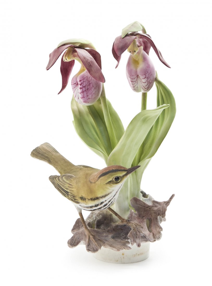 A Royal Worcester Dorothy Doughty Bird, Oven Bird: A Royal Worcester Dorothy Doughty Bird, Oven Bird, perched on oak leaves near lady's slipper orchids. Height 10 inches.