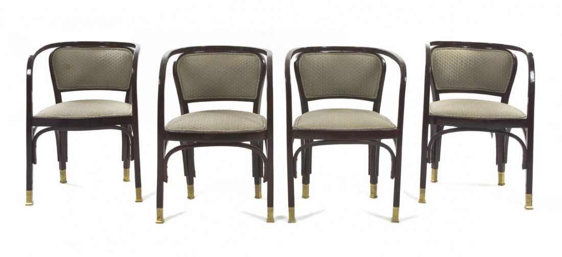 A Set of Four Austrian Bentwood Armchairs, Gustav: A Set of Four Austrian Bentwood Armchairs, Gustav Siegel, each having an upholstered back and seat within an open frame, raised on square legs ending in brass caps. Height 30 inches.