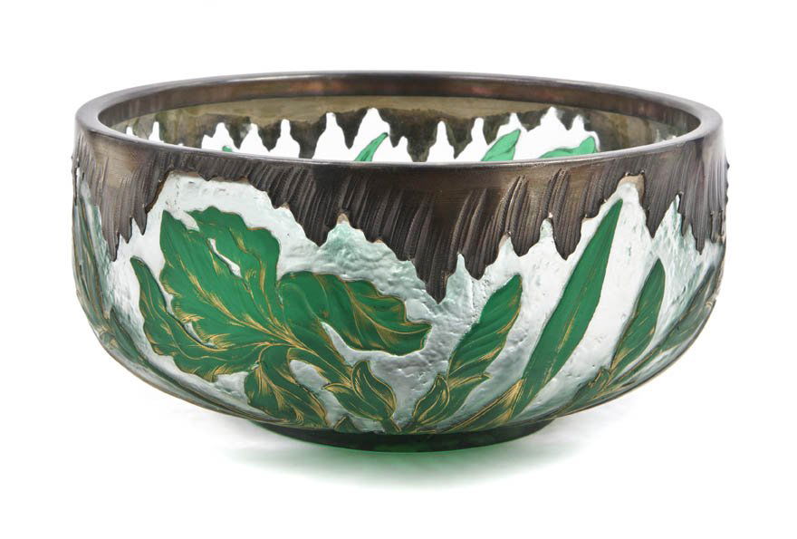 A Daum Silver Mounted Enameled Cameo Glass Center: A Daum Silver Mounted Enameled Cameo Glass Center Bowl, of circular form with conforming hallmarked mount, with gilt highlighted foliate decoration and traces of gilt enameled Daum Nancy mark to base.