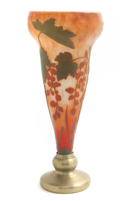 A Daum Gilt Bronze Mounted Cameo Glass Vase, Heig: A Daum Gilt Bronze Mounted Cameo Glass Vase, of tapering baluster form, decorated with berry laden branches, signed in cameo Daum Nancy with Cross of Lorraine. Height 11 1/4 inches. Property from the