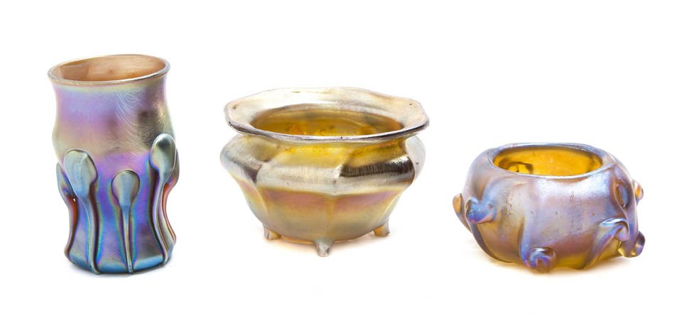 Three Tiffany Studios Favrile Glass Articles, Hei: Three Tiffany Studios Favrile Glass Articles, comprising two salts and a toothpick holder. Height of tallest 2 1/4 inches. Property from the Lucie Sable Sandler Trust, Lincolnwood, Illinois