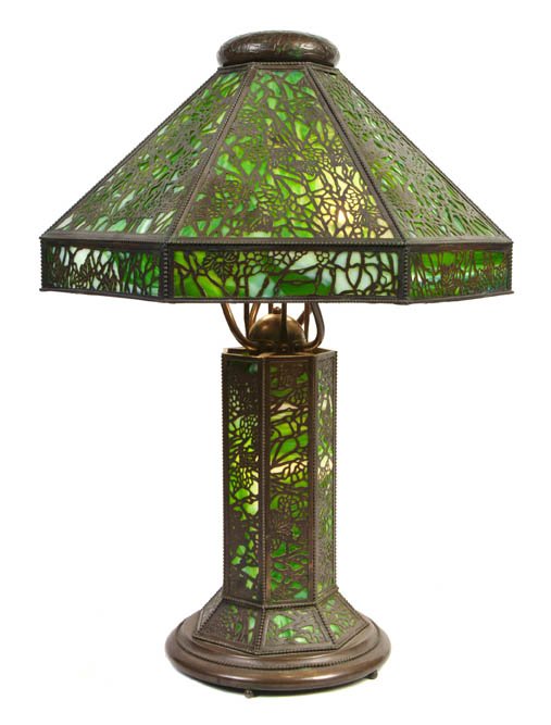 A Riviere Studios Slag Glass Overlay Table Lamp,: A Riviere Studios Slag Glass Overlay Table Lamp, the octagonal shade and base each with allover grapevine decoration. Height overall 28 inches. Property from the Lucie Sable Sandler Trust, Lincolnwood
