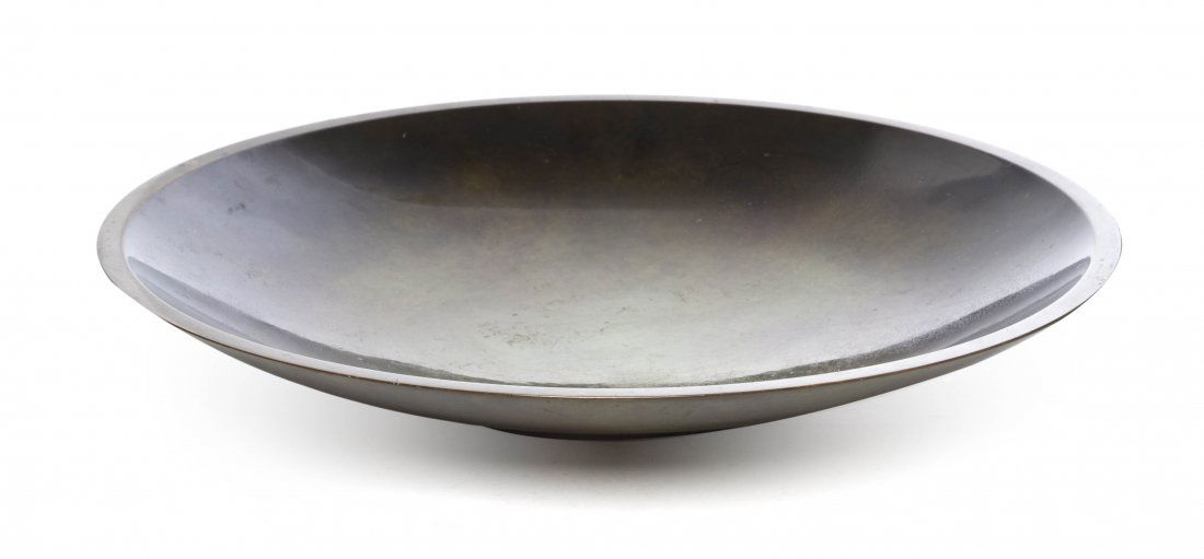 A Danish Bronze Bowl, Just Andersen, Diameter 12: A Danish Bronze Bowl, Just Andersen, of circular form with patination throughout, stamped Denmark Just B1773. Diameter 12 3/8 inches.