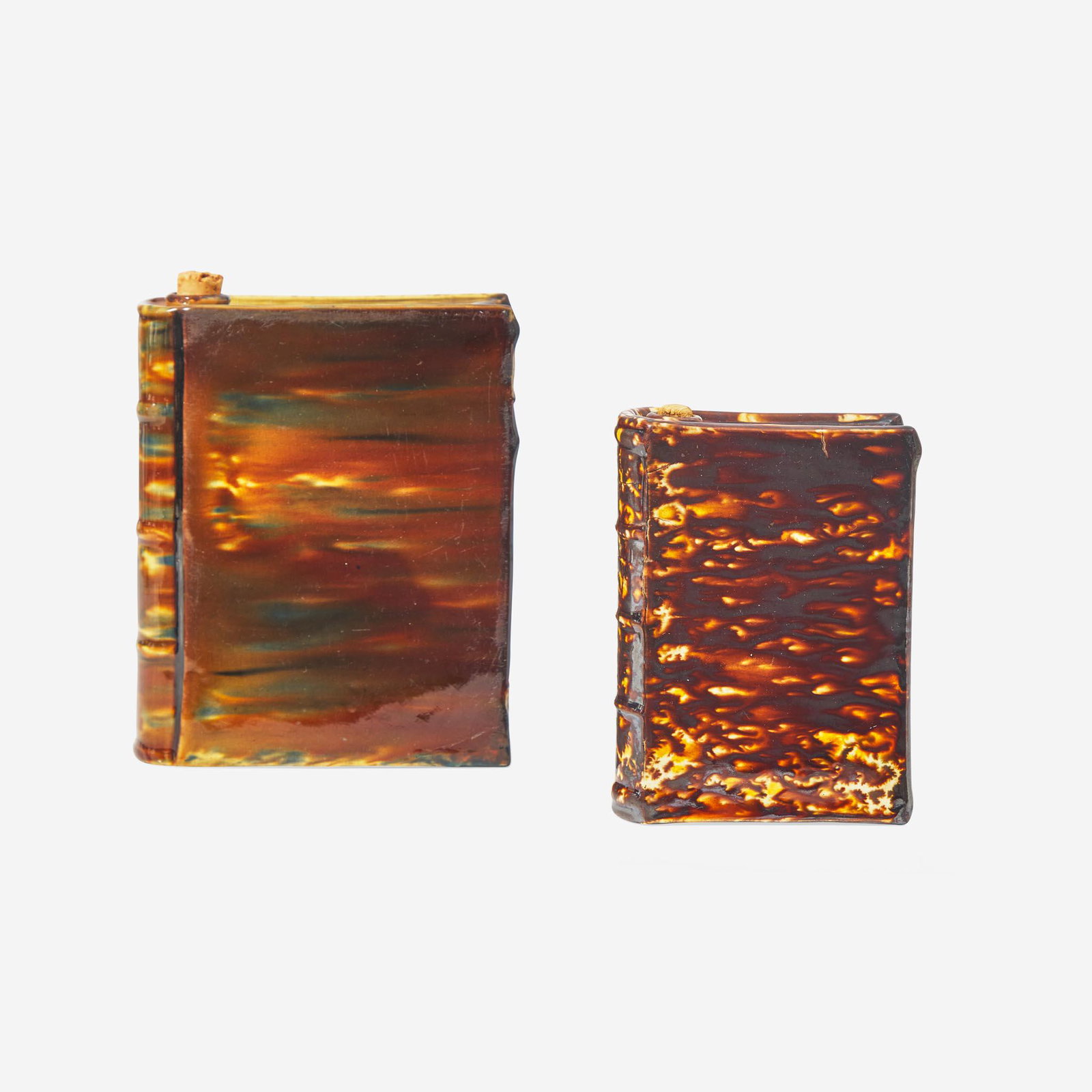 Two Rockingham or flint enamel glazed yellowware book-form flasks Probably Lyman Fenton & Co., (1 of 3)